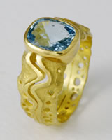 Giant clam shell ring with large Aqua-marine